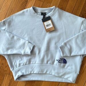 The North Face sweat-shirt in periwinkle blue w/dark blue logo on the front/back